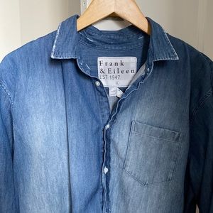 Long sleeve Famous distressed denim shirt. A must have foundational piece!